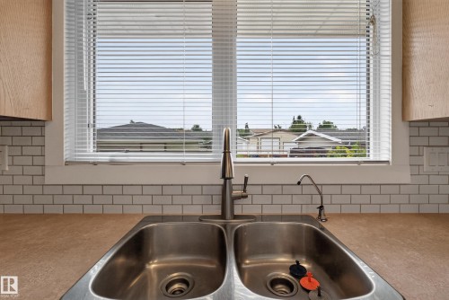 8015 145 Avenue Nw, Edmonton, AB - Indoor Photo Showing Kitchen With Double Sink