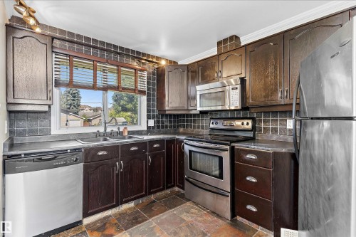 8936 154 Street Nw, Edmonton, AB - Indoor Photo Showing Kitchen With Double Sink