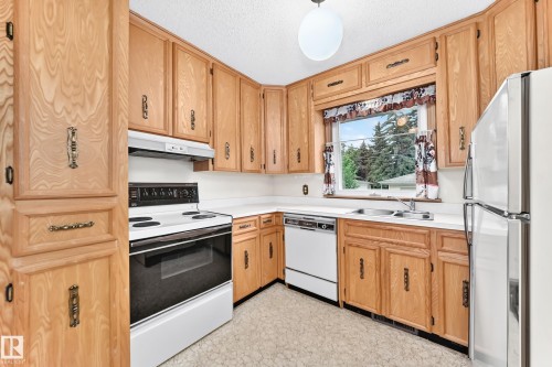 12720 120 Avenue Nw, Edmonton, AB - Indoor Photo Showing Kitchen With Double Sink