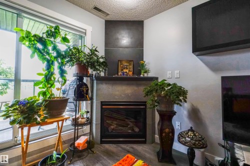 #128 279 Suder Greens Dr Nw, Edmonton, AB - Indoor With Fireplace