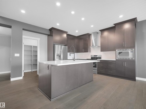 20715 27 Avenue Nw, Edmonton, AB - Indoor Photo Showing Kitchen With Upgraded Kitchen