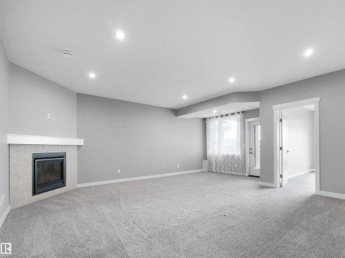 20715 27 Avenue Nw, Edmonton, AB - Indoor With Fireplace