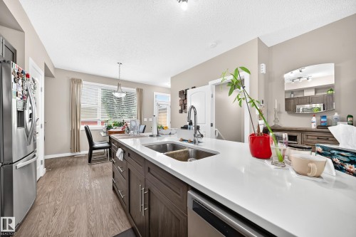 6136 Rosenthal Way Nw, Edmonton, AB - Indoor Photo Showing Kitchen With Double Sink With Upgraded Kitchen