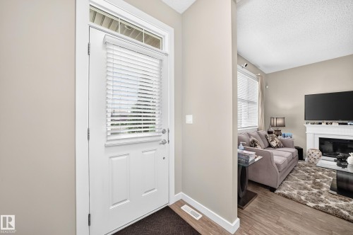 6136 Rosenthal Way Nw, Edmonton, AB - Indoor With Fireplace
