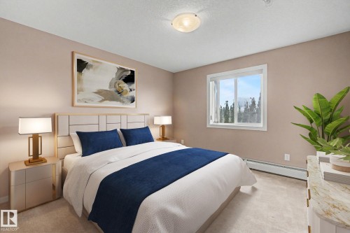 #323 240 Spruce Ridge Rd, Spruce Grove, AB - Indoor Photo Showing Bedroom