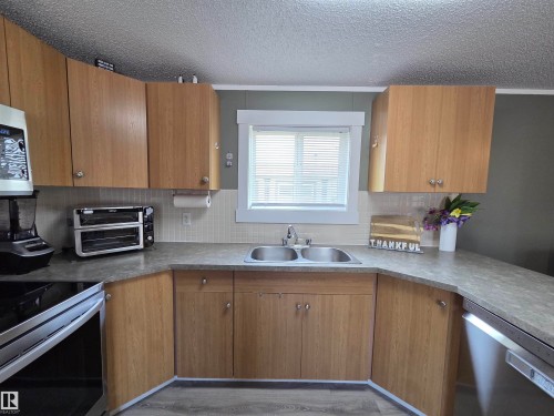 10 Midland Road, Millet, AB - Indoor Photo Showing Kitchen With Double Sink