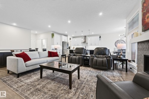 91 Harvest Crescent, Ardrossan, AB - Indoor Photo Showing Living Room With Fireplace