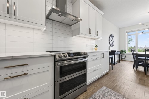 91 Harvest Crescent, Ardrossan, AB - Indoor Photo Showing Kitchen With Upgraded Kitchen