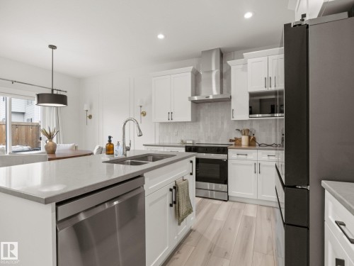 3808 42 Avenue, Beaumont, AB - Indoor Photo Showing Kitchen With Double Sink With Upgraded Kitchen
