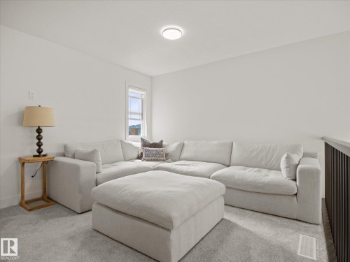 3808 42 Avenue, Beaumont, AB - Indoor Photo Showing Living Room
