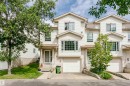 Multi-story residence featuring light-colored siding and a gabled roofline - #42 9630 176 St Nw, Edmonton, AB  - Outdoor With Facade 