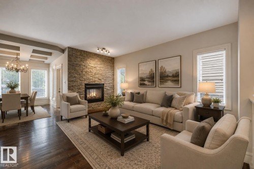 1047 Armitage Crescent Sw, Edmonton, AB - Indoor Photo Showing Living Room With Fireplace