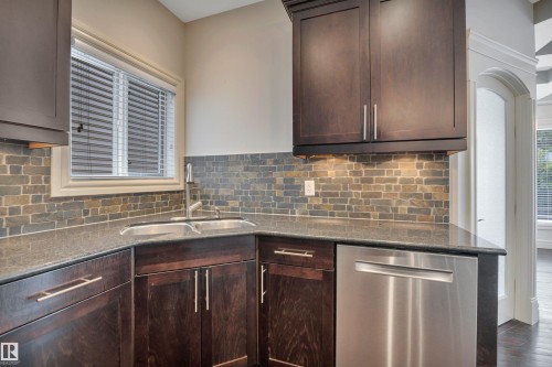 1047 Armitage Crescent Sw, Edmonton, AB - Indoor Photo Showing Kitchen With Double Sink