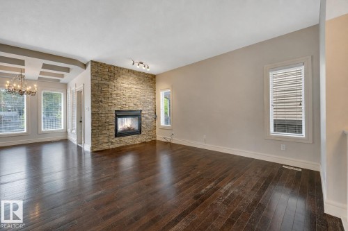 1047 Armitage Crescent Sw, Edmonton, AB - Indoor Photo Showing Living Room With Fireplace