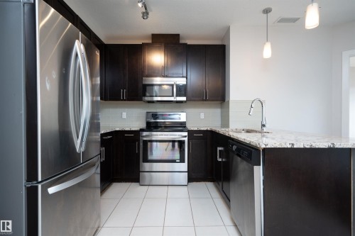 #323 5151 Windermere Bv Sw, Edmonton, AB - Indoor Photo Showing Kitchen With Upgraded Kitchen