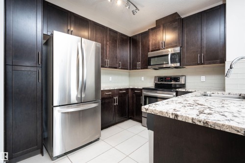#323 5151 Windermere Bv Sw, Edmonton, AB - Indoor Photo Showing Kitchen