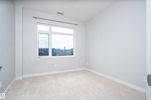 #323 5151 Windermere Bv Sw, Edmonton, AB - Indoor Photo Showing Other Room