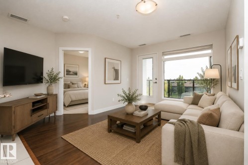 #323 5151 Windermere Bv Sw, Edmonton, AB - Indoor Photo Showing Living Room