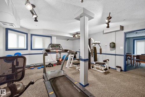 #206 7839 96 St Nw, Edmonton, AB - Indoor Photo Showing Gym Room
