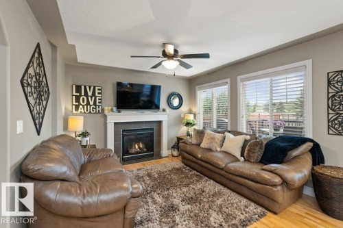15 Napoleon Crescent, St. Albert, AB - Indoor Photo Showing Living Room With Fireplace