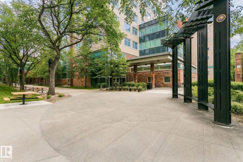 Multi-story building featuring brick and glass panel exterior - 11139 62 Avenue Nw, Edmonton, AB - Outdoor