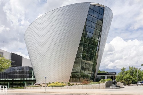 Curved metal panel facade with extensive glass curtain wall - 11139 62 Avenue Nw, Edmonton, AB - Outdoor
