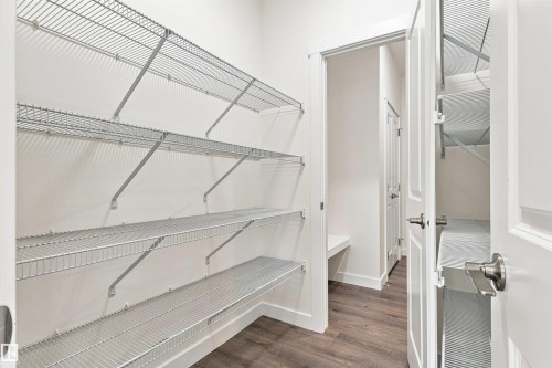 Wire shelving system - 22019 82 Avenue Nw, Edmonton, AB - Indoor With Storage