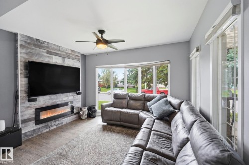 10528 45 Street Nw, Edmonton, AB - Indoor Photo Showing Living Room With Fireplace