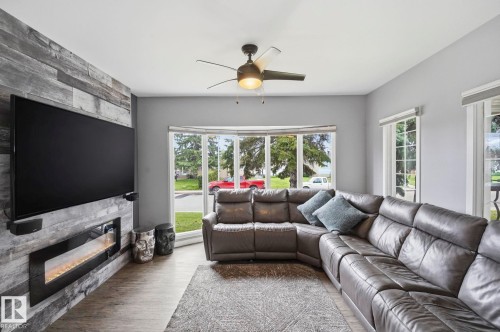 10528 45 Street Nw, Edmonton, AB - Indoor Photo Showing Living Room With Fireplace