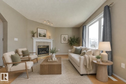 11335 167B Ave Nw, Edmonton, AB - Indoor Photo Showing Living Room With Fireplace