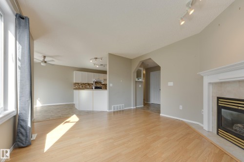 11335 167B Ave Nw, Edmonton, AB - Indoor Photo Showing Living Room With Fireplace
