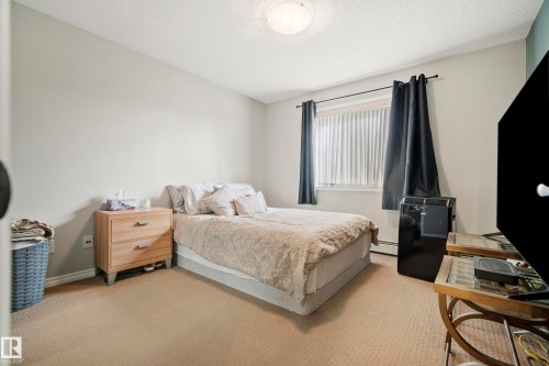 #340 2436 Guardian Rd Nw, Edmonton, AB - Indoor Photo Showing Bedroom
