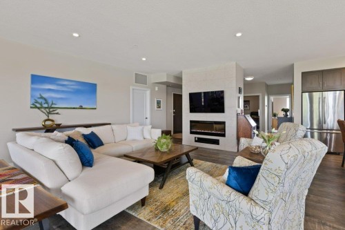 #741 200 Bellerose Dr, St. Albert, AB - Indoor Photo Showing Living Room With Fireplace
