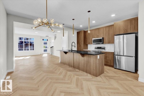 #71 16231 19 Av Sw, Edmonton, AB - Indoor Photo Showing Kitchen With Upgraded Kitchen