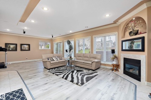 15816 64 Street Nw, Edmonton, AB - Indoor Photo Showing Living Room With Fireplace