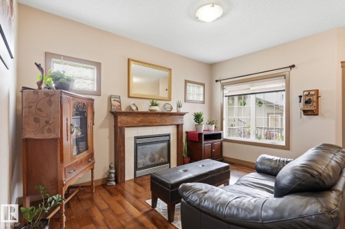 #10 340 Spruce Ridge Rd, Spruce Grove, AB - Indoor Photo Showing Living Room With Fireplace