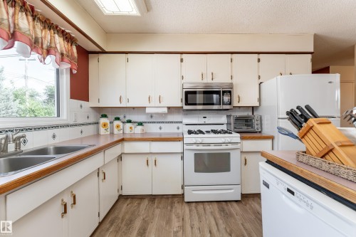 7 Camelot Crescent, Leduc, AB - Indoor Photo Showing Kitchen With Double Sink