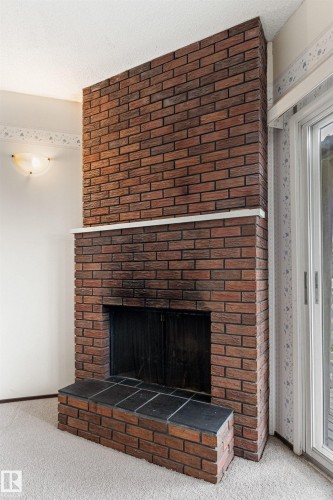 1984 68 Street Nw, Edmonton, AB - Indoor Photo Showing Living Room With Fireplace