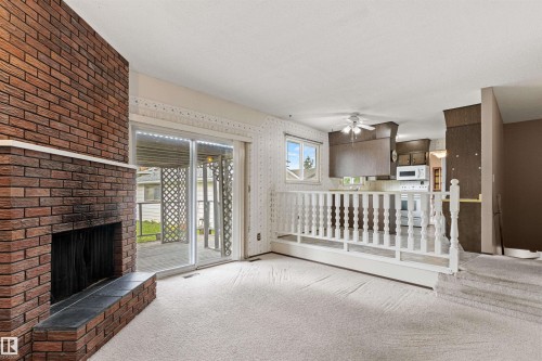 1984 68 Street Nw, Edmonton, AB - Indoor Photo Showing Other Room With Fireplace