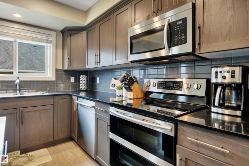 5703 66 Street, Beaumont, AB - Indoor Photo Showing Kitchen With Stainless Steel Kitchen