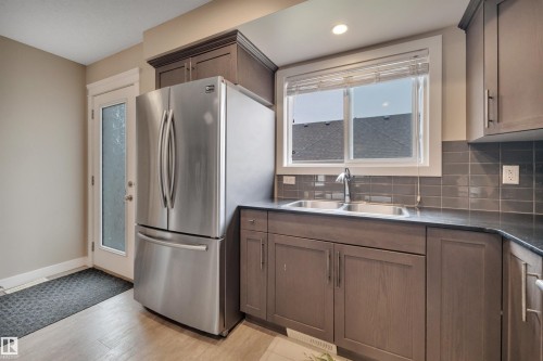 5703 66 Street, Beaumont, AB - Indoor Photo Showing Kitchen With Double Sink
