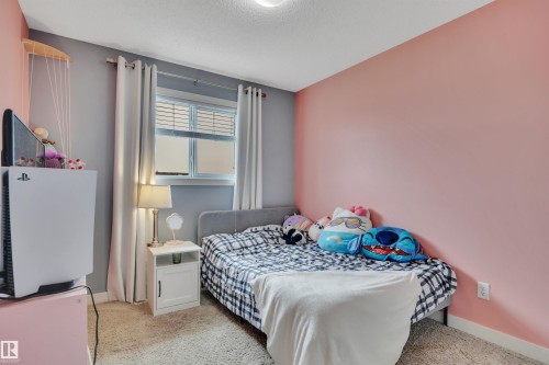 5703 66 Street, Beaumont, AB - Indoor Photo Showing Bedroom