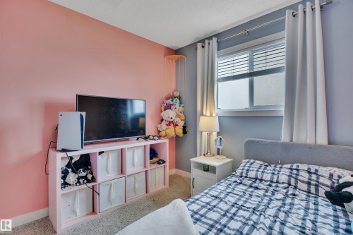 5703 66 Street, Beaumont, AB - Indoor Photo Showing Bedroom
