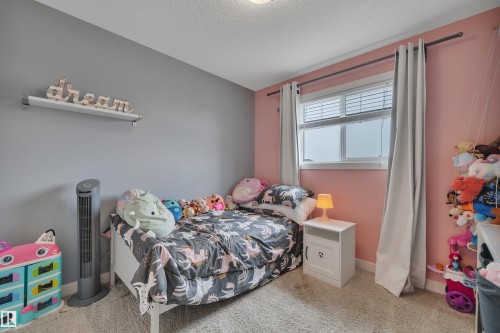 5703 66 Street, Beaumont, AB - Indoor Photo Showing Bedroom