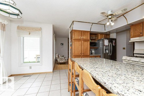 3303 42A Avenue Nw, Edmonton, AB - Indoor Photo Showing Kitchen