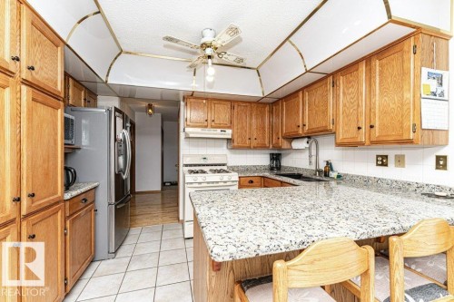 3303 42A Avenue Nw, Edmonton, AB - Indoor Photo Showing Kitchen