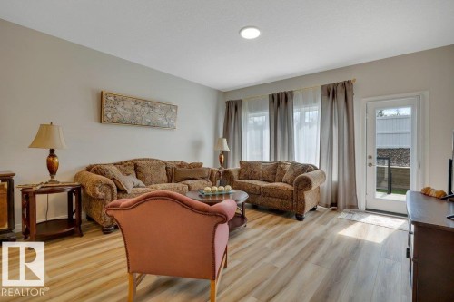 169 Stonehouse Way, Leduc, AB - Indoor Photo Showing Living Room