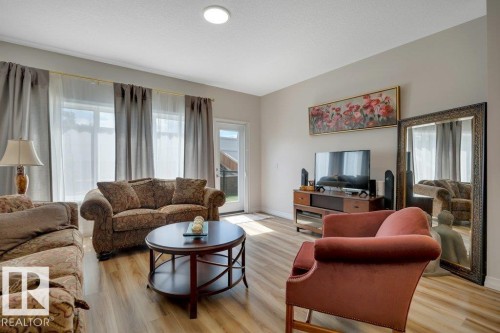 169 Stonehouse Way, Leduc, AB - Indoor Photo Showing Living Room