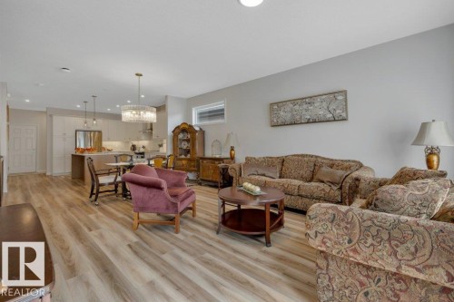169 Stonehouse Way, Leduc, AB - Indoor Photo Showing Living Room