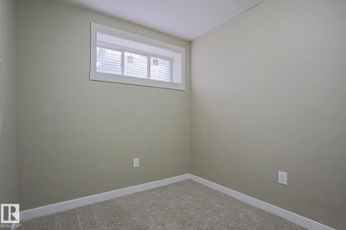 1456 33B Street Nw, Edmonton, AB - Indoor Photo Showing Other Room